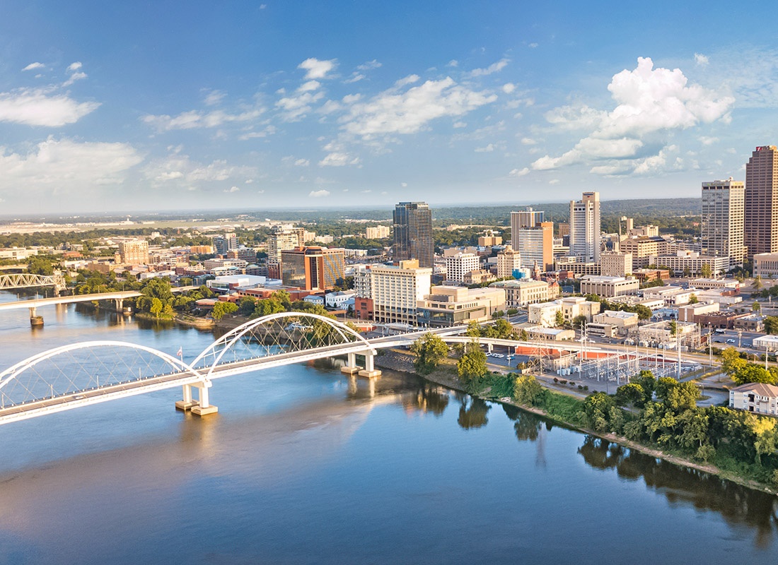 Contact - Aerial view of downtown Little Rock with a couple of bridges in view